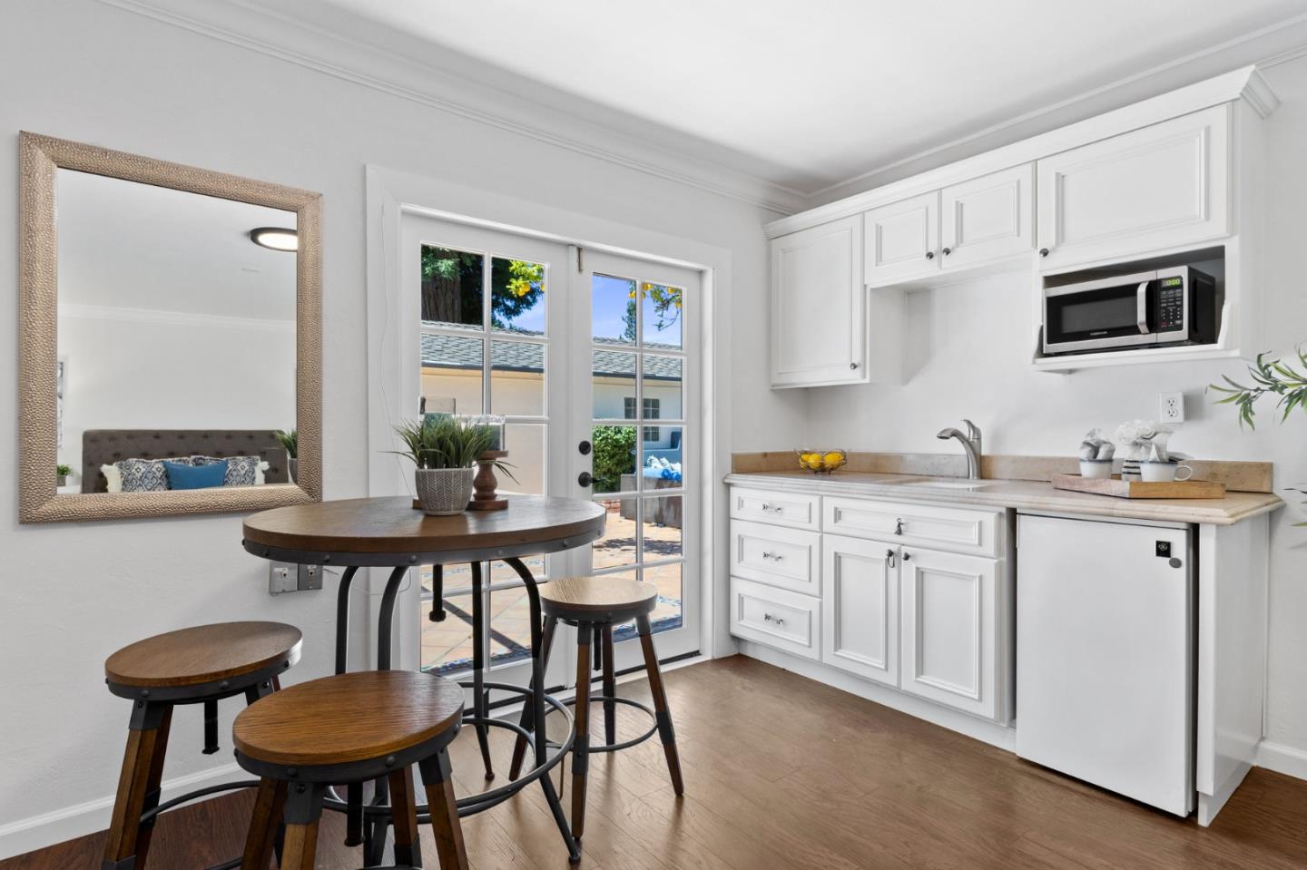 1205 Fewtrell Drive Campbell, CA 95008 - Photo 30 of 52 a kitchen with stainless steel appliances granite countertop a dining table chairs and a refrigerator