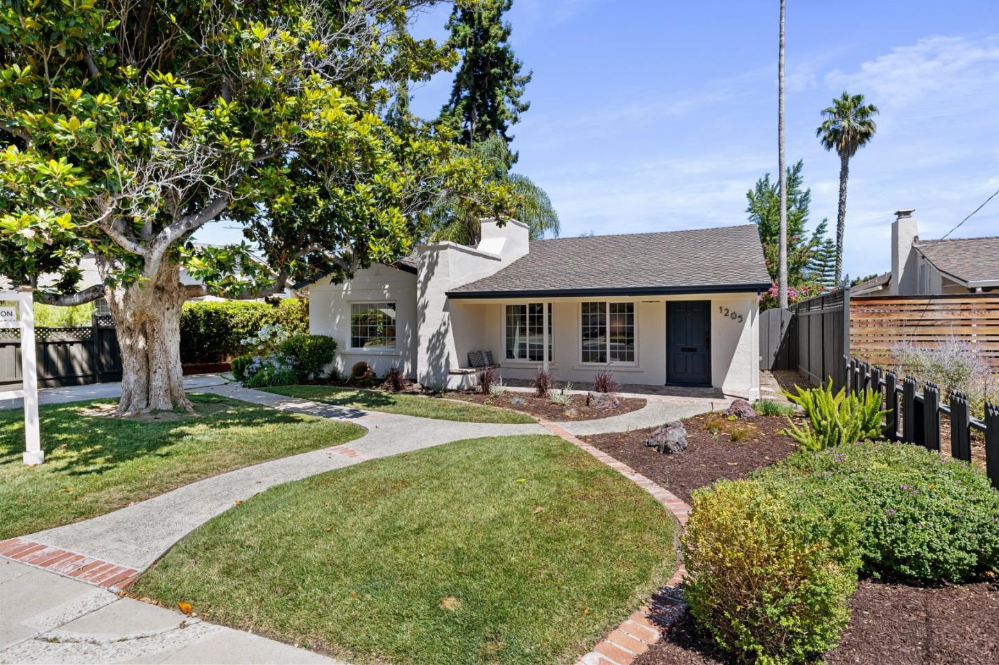 1205 Fewtrell Drive Campbell, CA 95008 - Photo 3 of 52 a front view of a house with swimming garden and patio