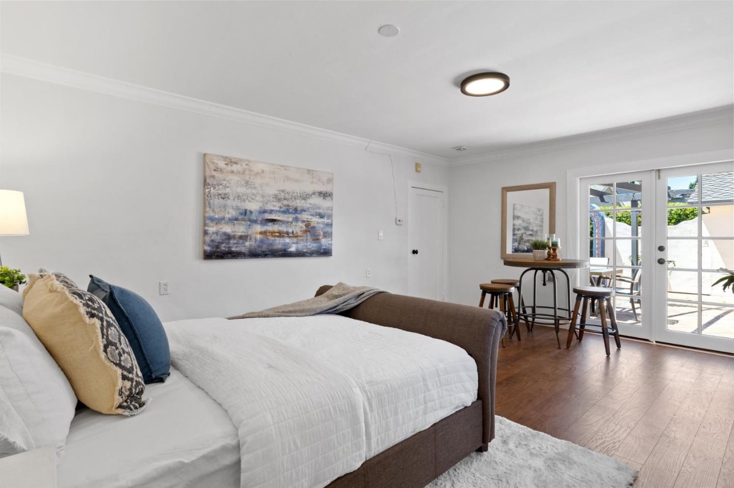 1205 Fewtrell Drive Campbell, CA 95008 - Photo 31 of 52 a bedroom with a bed and a table