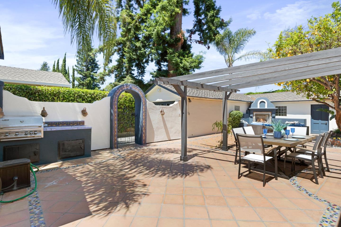 1205 Fewtrell Drive Campbell, CA 95008 - Photo 33 of 52 a building outdoor space with patio furniture and potted plants