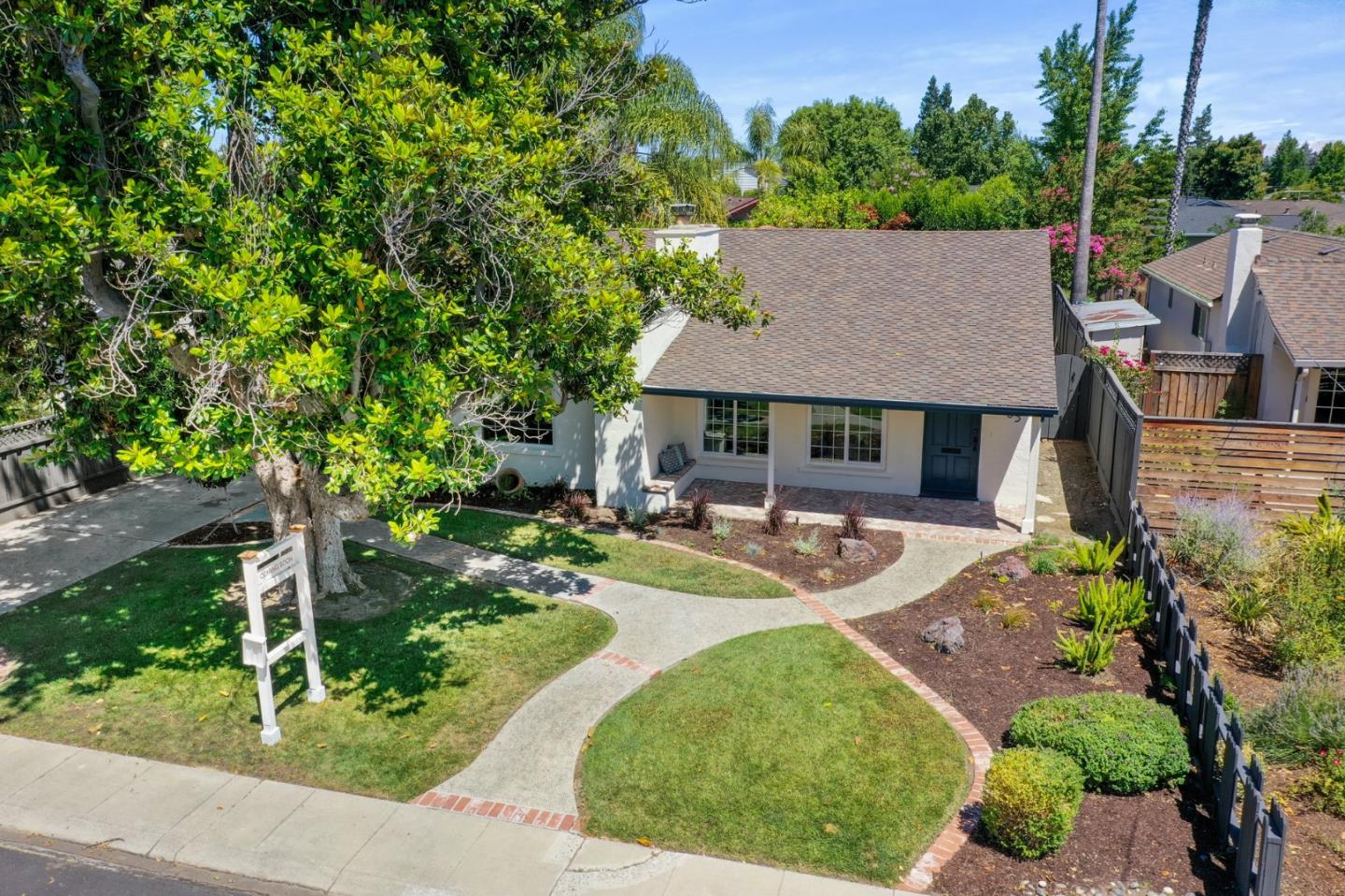 1205 Fewtrell Drive Campbell, CA 95008 - Photo 47 of 52 a house with lots of trees in the background
