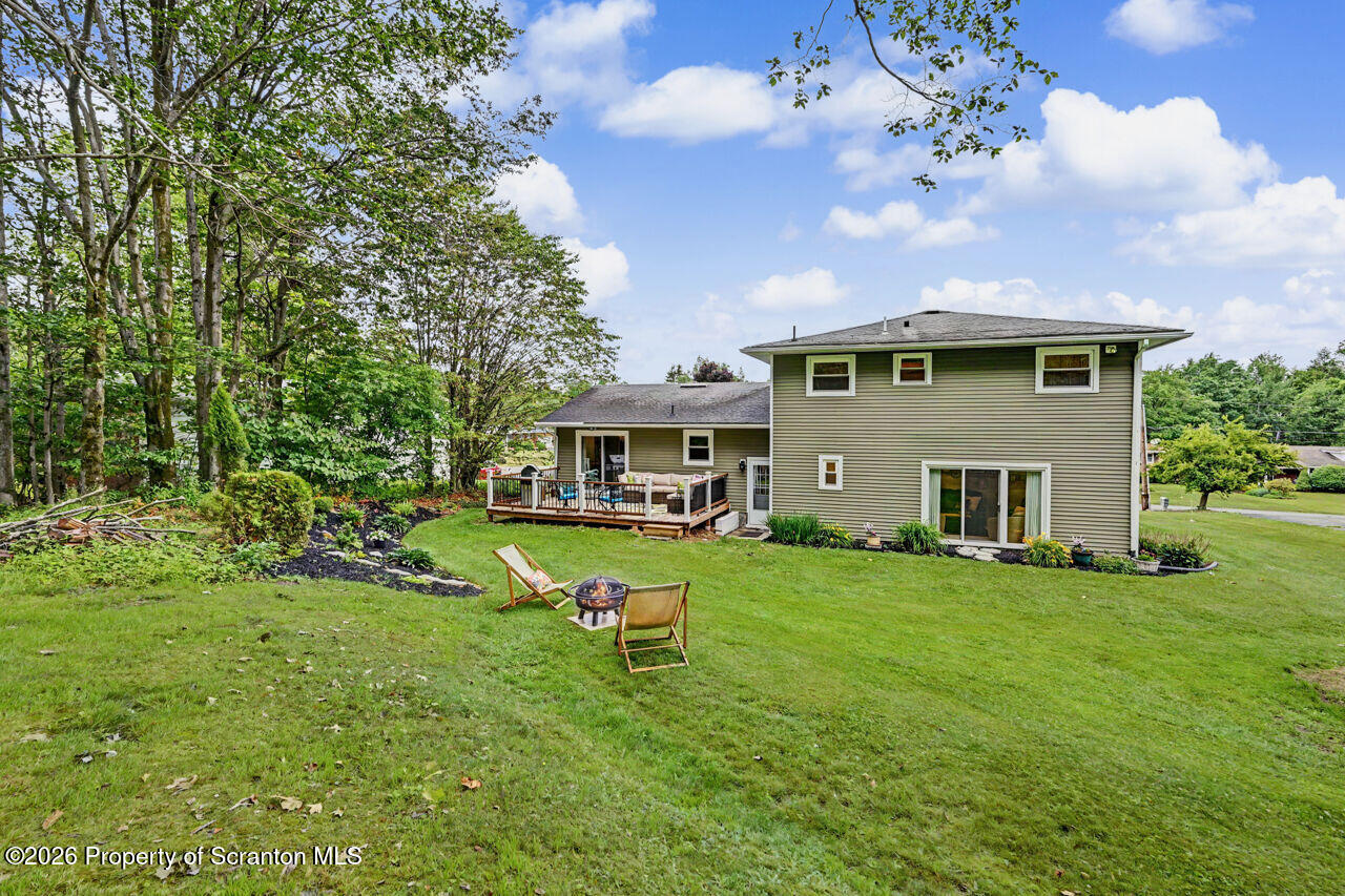 121 T Rt 351 Moscow, PA 18444 - Photo 75 of 79 a front view of a house with a garden