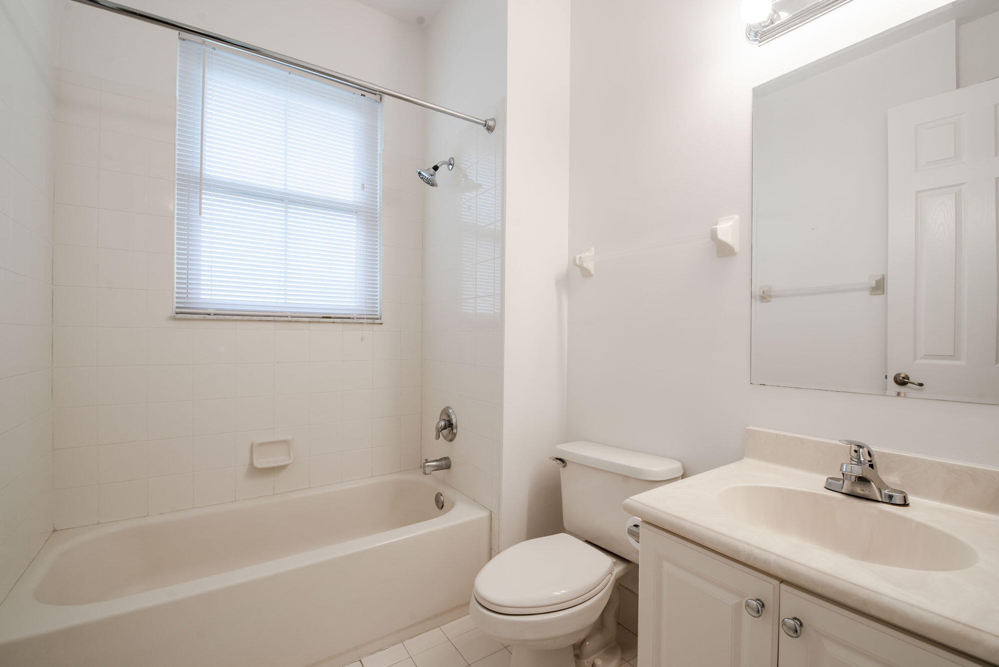 1484 Frederick Small Road Jupiter, FL 33458 - Photo 14 of 19 a bathroom with a sink toilet and shower