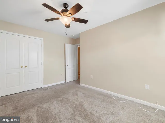 a bathroom with a sink toilet a mirror and shower