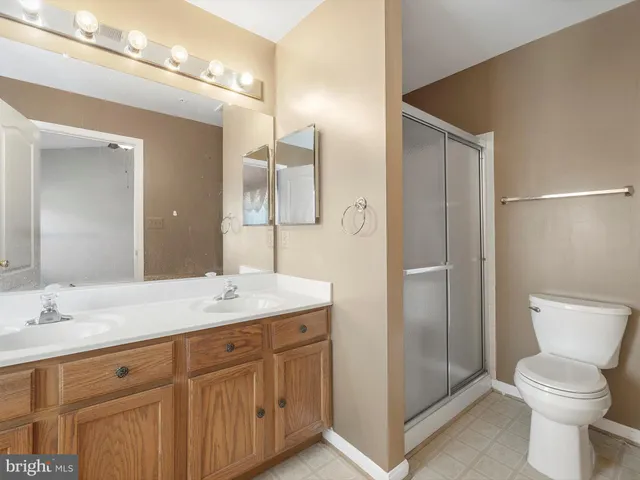 a bathroom with a bathtub and window