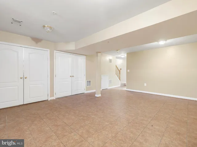 a view of a house with wooden stairs