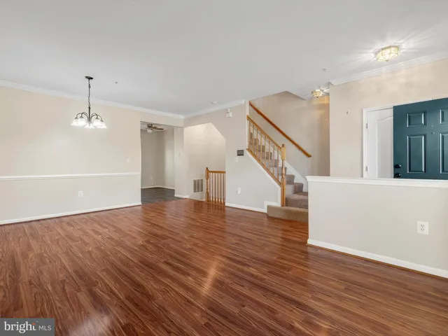 a view of entryway with wooden floor