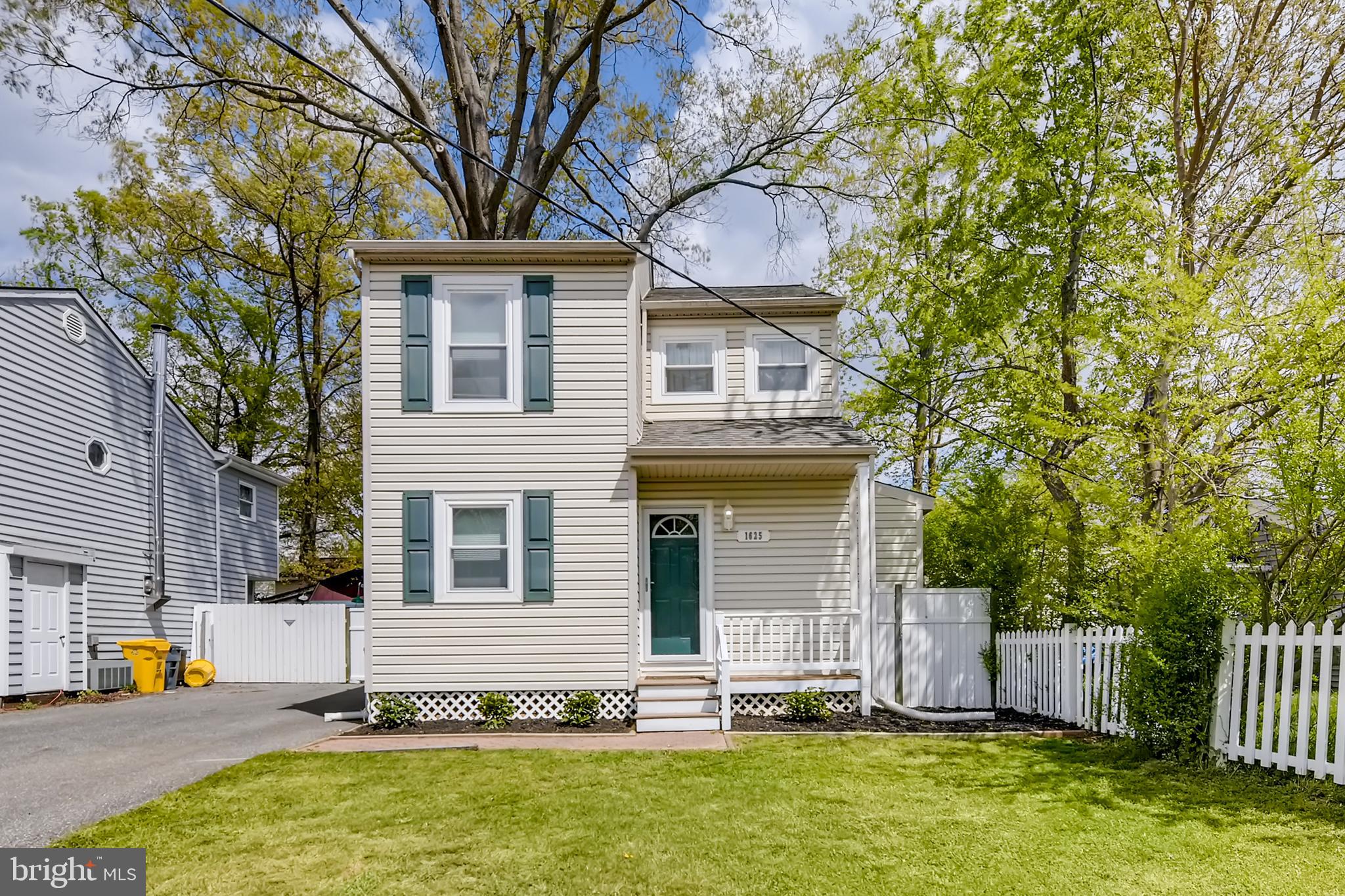1625 Hilltop Road Edgewater, MD 21037 - Photo 1 of 38 a front view of a house with a yard