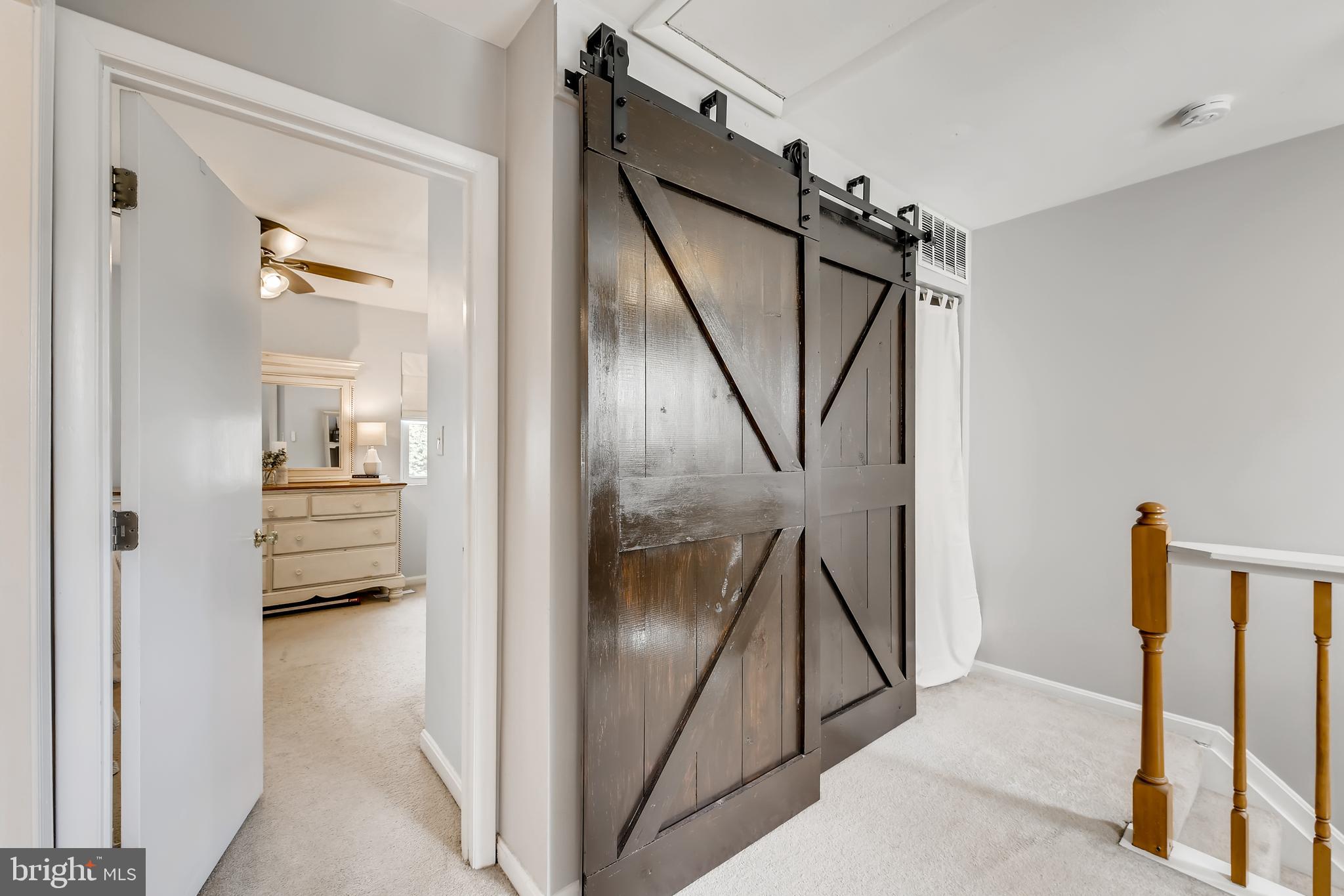 1625 Hilltop Road Edgewater, MD 21037 - Photo 23 of 38 a view of a hallway with wooden floor and entryway
