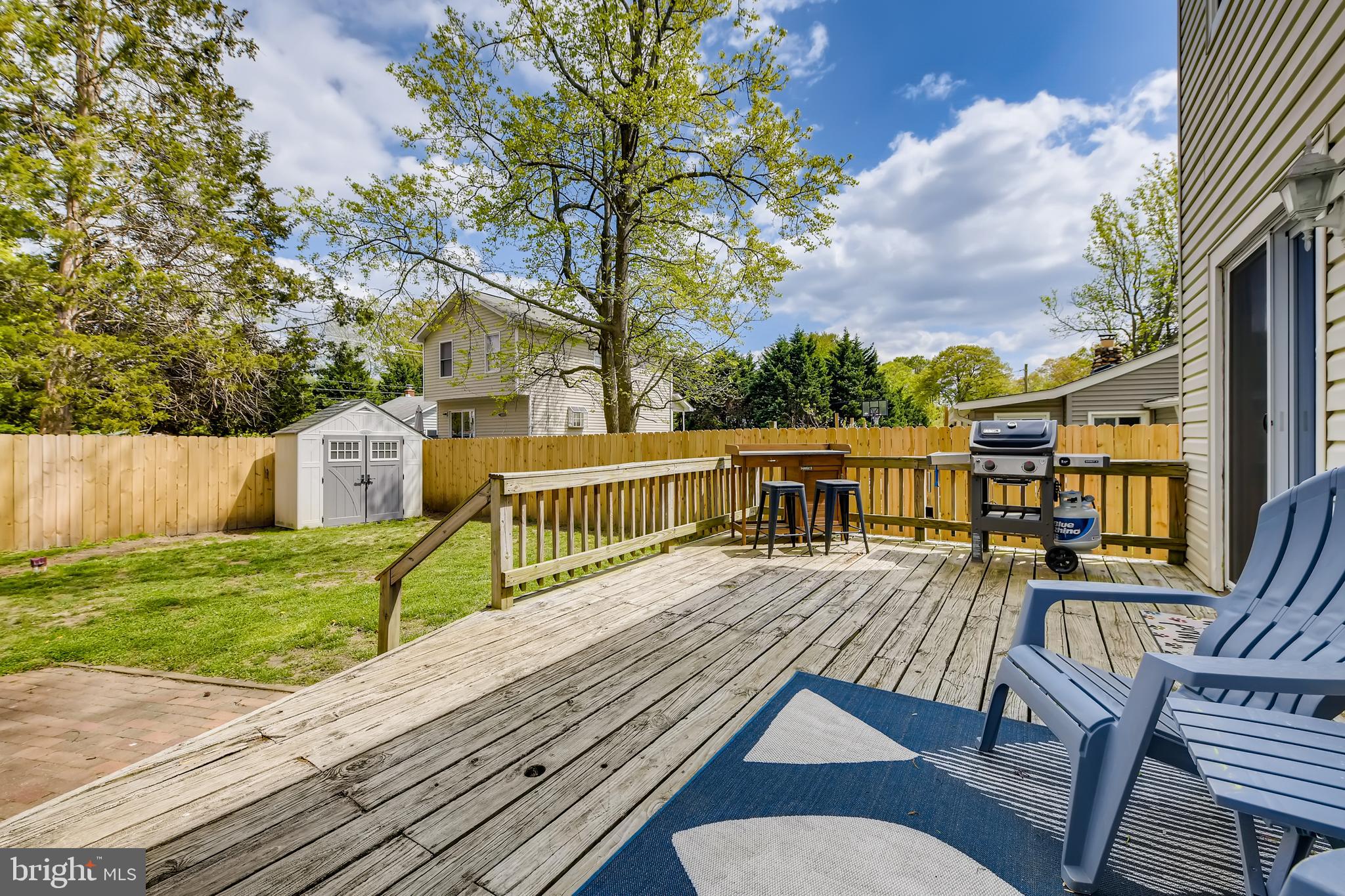 1625 Hilltop Road Edgewater, MD 21037 - Photo 34 of 38 a view of a house with backyard and deck