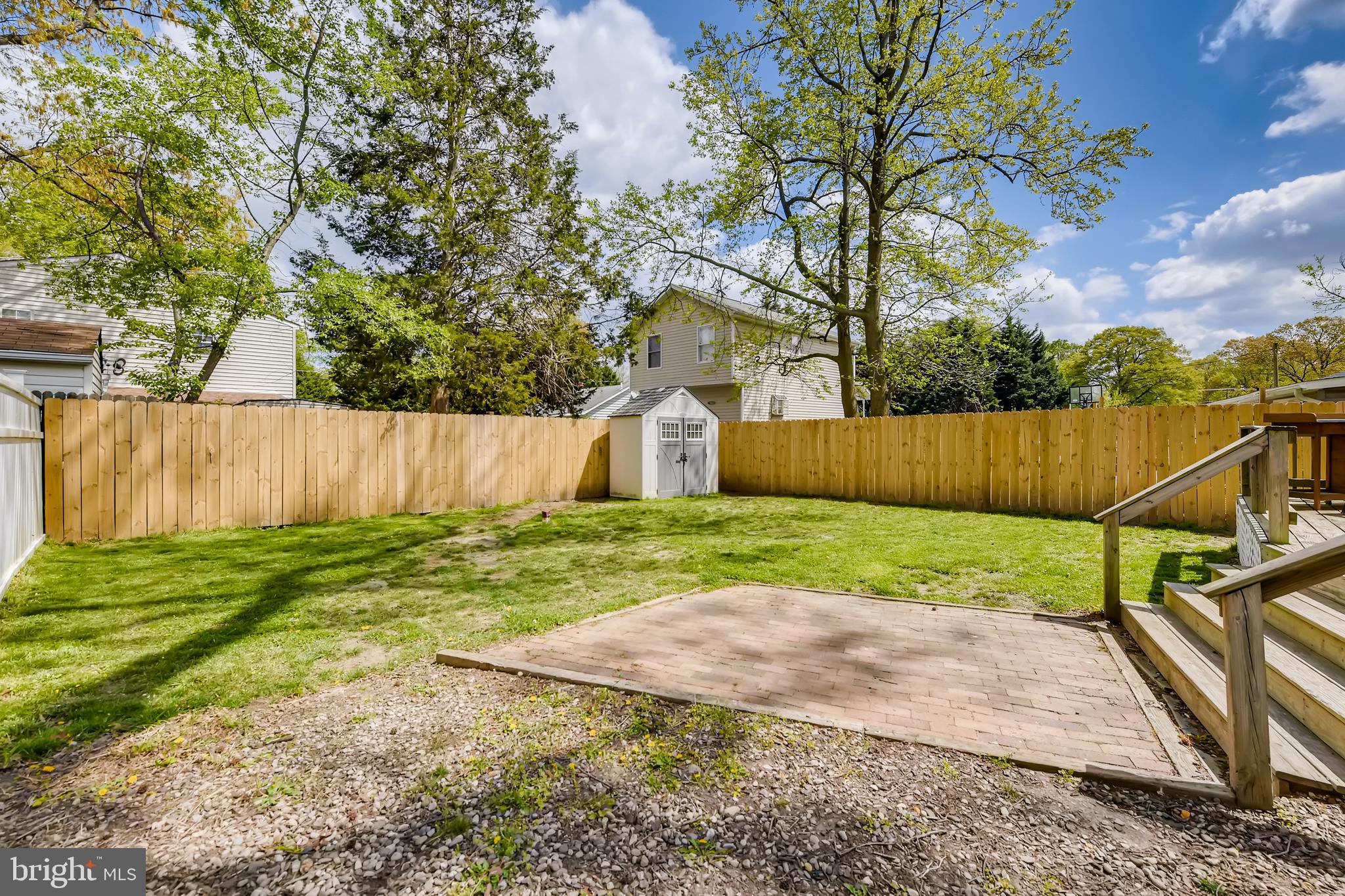 1625 Hilltop Road Edgewater, MD 21037 - Photo 35 of 38 a view of a backyard with wooden fence