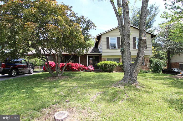 15313 Good Hope Road Silver Spring, MD 20905 - Photo 1 of 10 a view of a house with a backyard