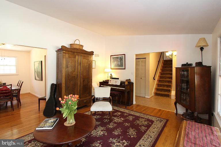 15313 Good Hope Road Silver Spring, MD 20905 - Photo 6 of 10 a living room with furniture and a wooden floor