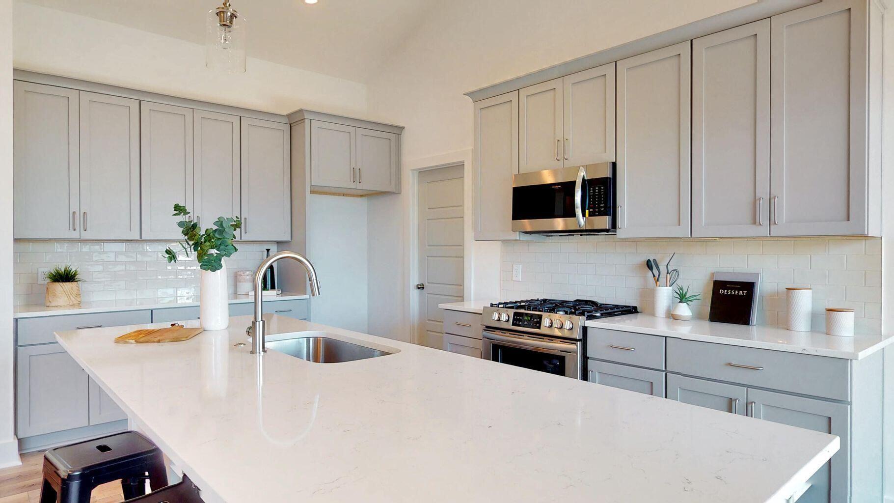 1570 Charming Nancy Road Charleston, SC 29412 - Photo 26 of 36 Example kitchen with gray cabinets