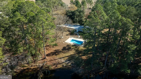 a view of a yard with an outdoor space