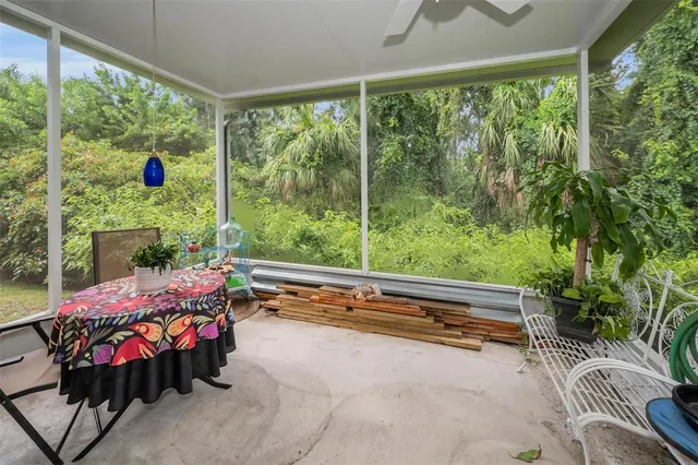 a view of two chairs in the balcony