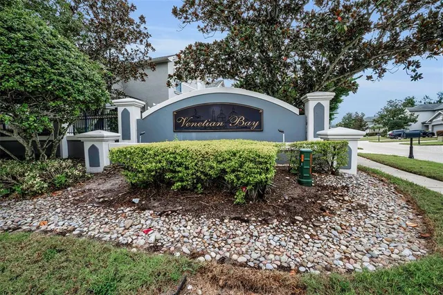 a view of a swimming pool with a garden
