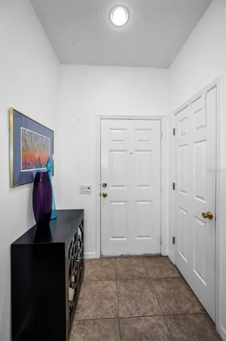 a living room with a baby crib