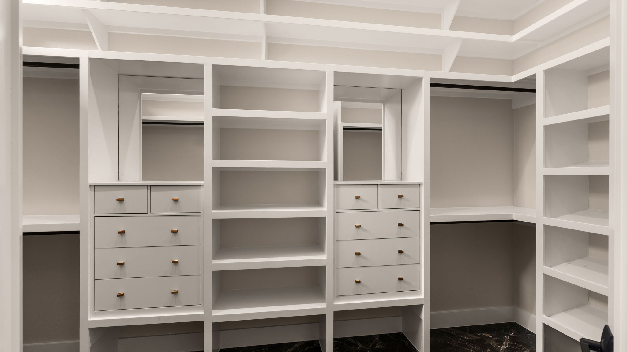 1909 West 40th Street Austin, TX 78731 - Photo 21 of 40 a view of walk in closet with empty racks