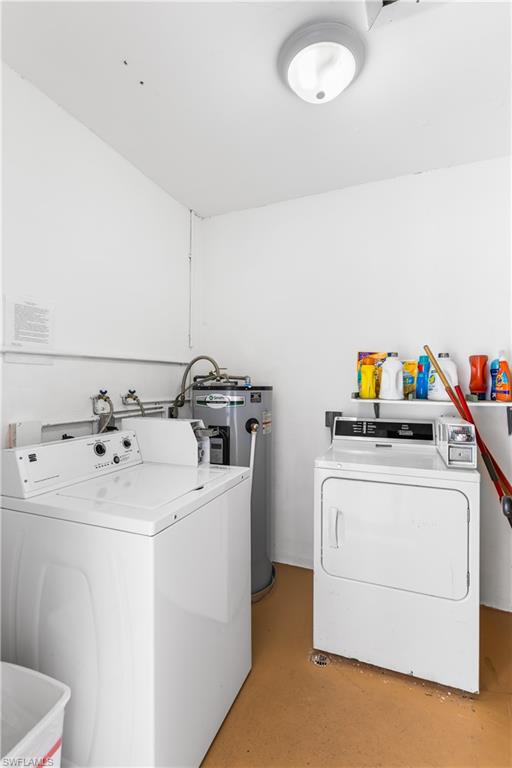 940 3rd Street South, Unit 201 Naples, FL 34102 - Photo 18 of 27 a utility room with dryer and washer