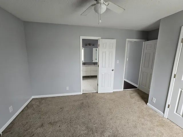 an empty room with a bathroom