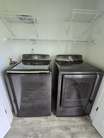 a stove top oven sitting inside of a kitchen
