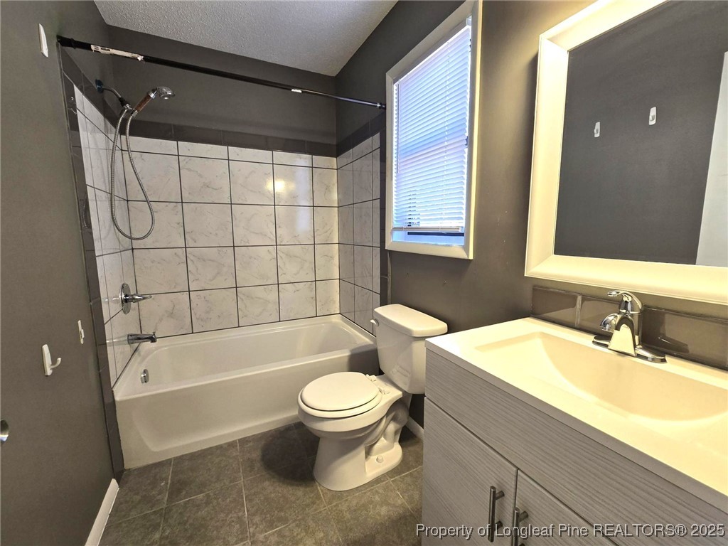 1540 Graystone Road Fayetteville, NC 28311 - Photo 12 of 19 a bathroom with a sink toilet and shower