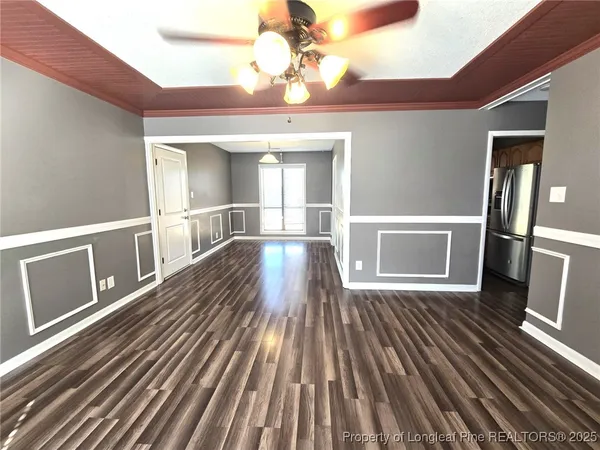 a view of a livingroom with a furniture