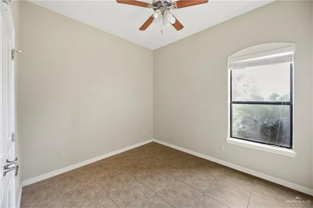 a bathroom with a toilet and a bathtub
