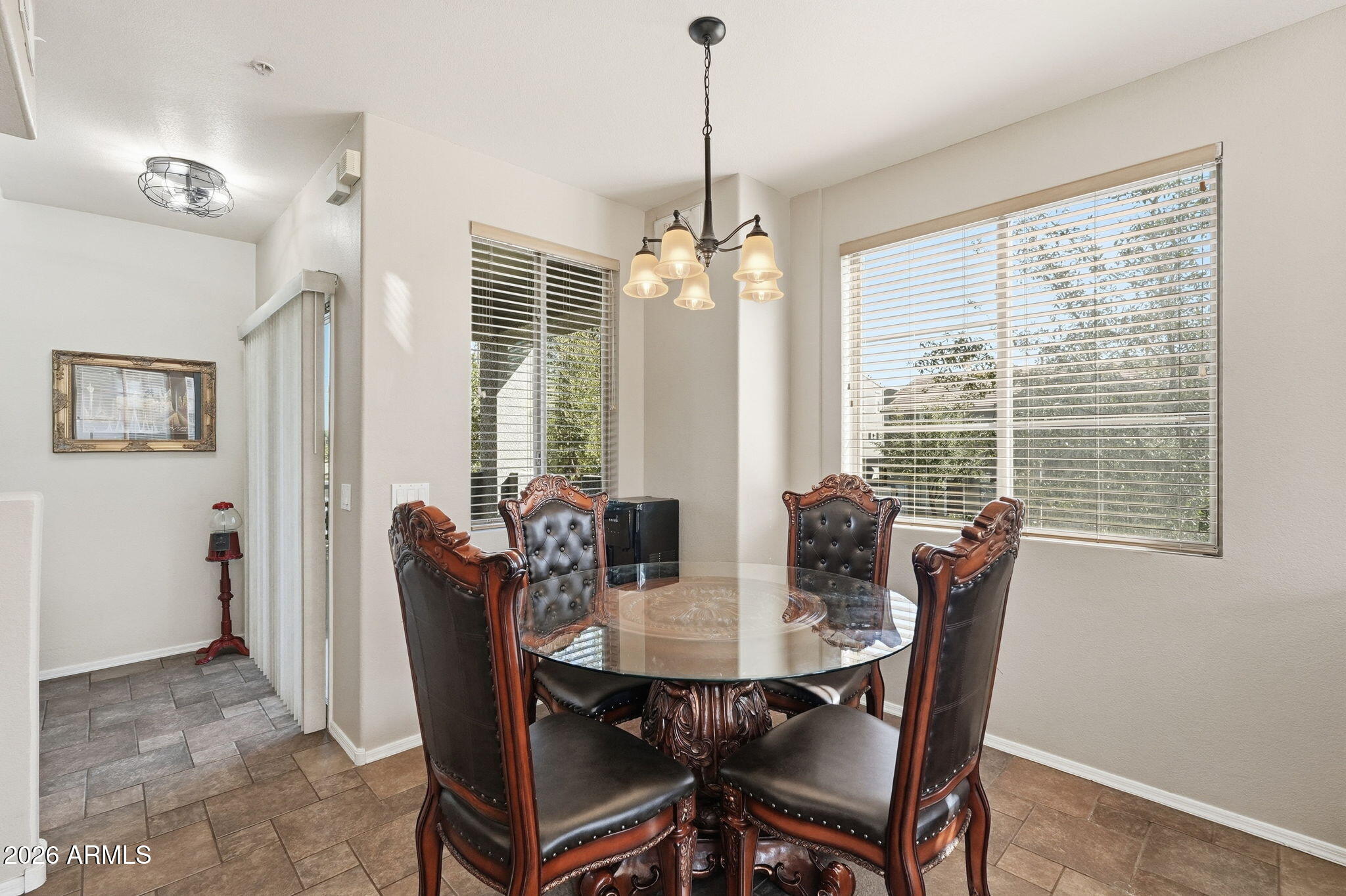 280 South Evergreen Road, Unit 1320 Tempe, AZ 85288 - Photo 7 of 14 a view of a dining room with furniture window and outside view