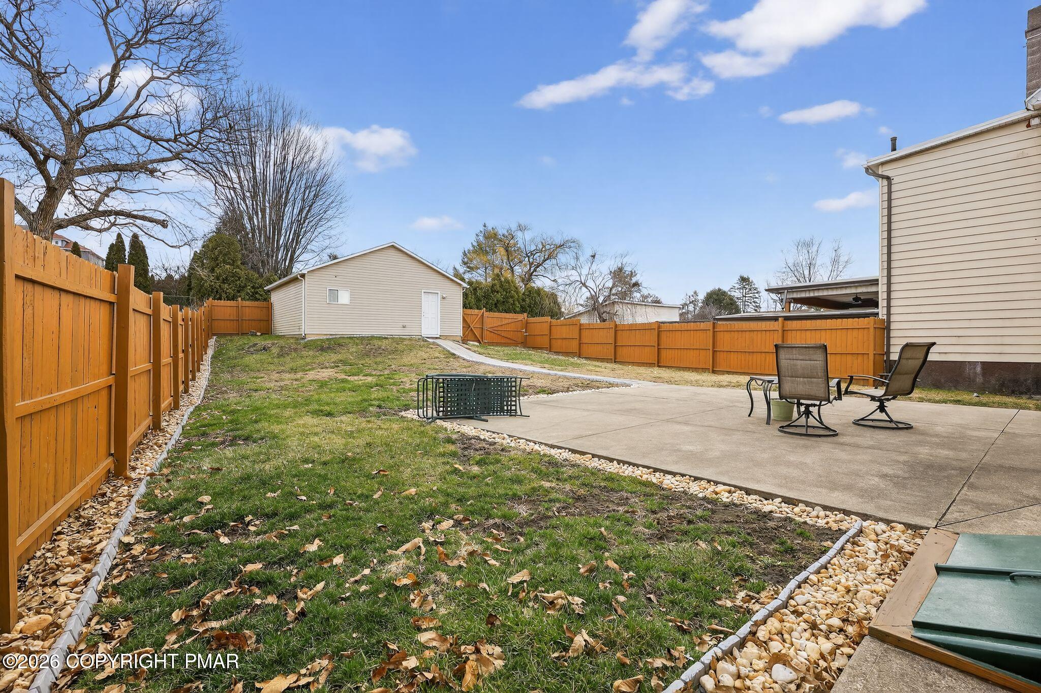 411 Moosic Road Old Forge, PA 18518 - Photo 11 of 59 a view of a yard with an outdoor space