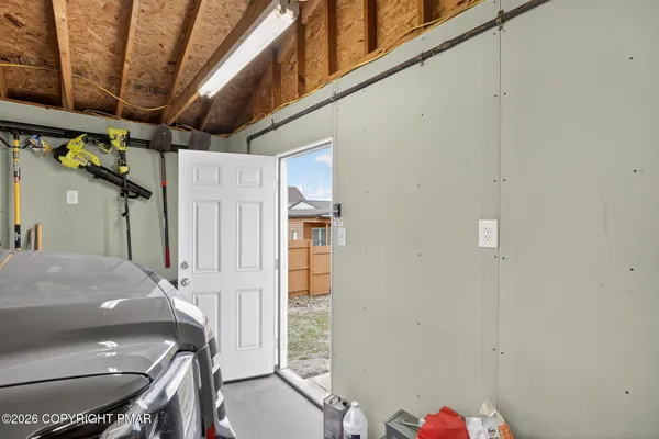 a kitchen with a stove and a microwave