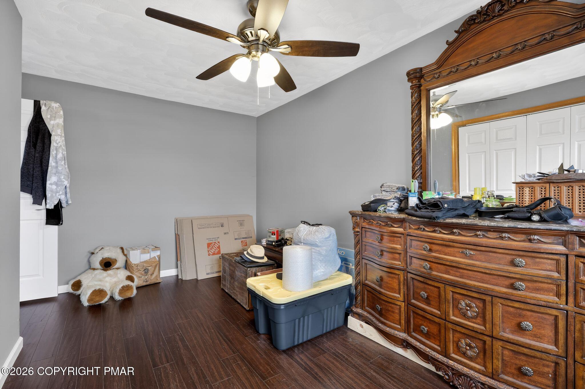 411 Moosic Road Old Forge, PA 18518 - Photo 36 of 59 a living room with furniture and a flat screen tv