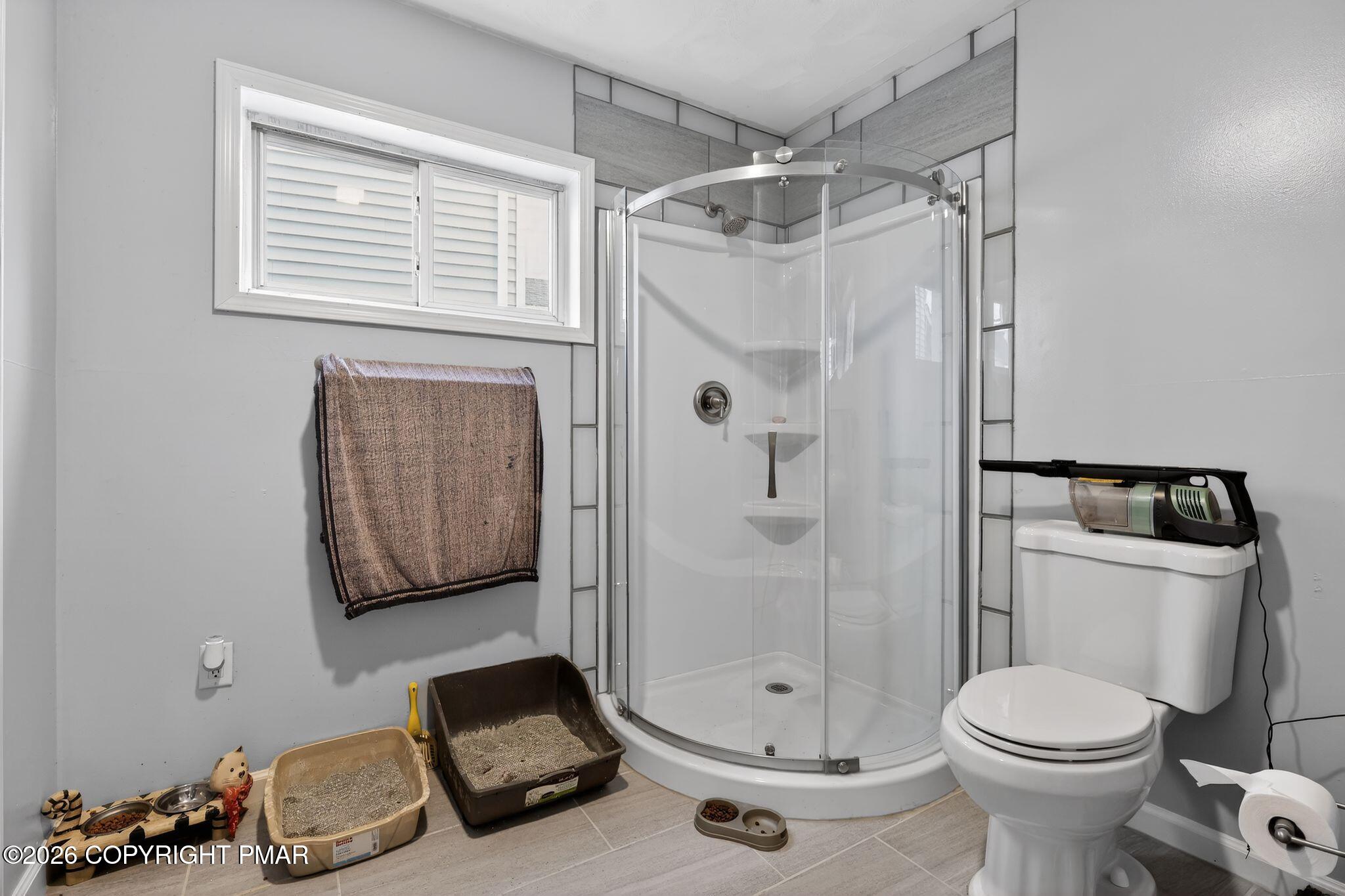 411 Moosic Road Old Forge, PA 18518 - Photo 38 of 59 a bathroom with a toilet shower and a sink