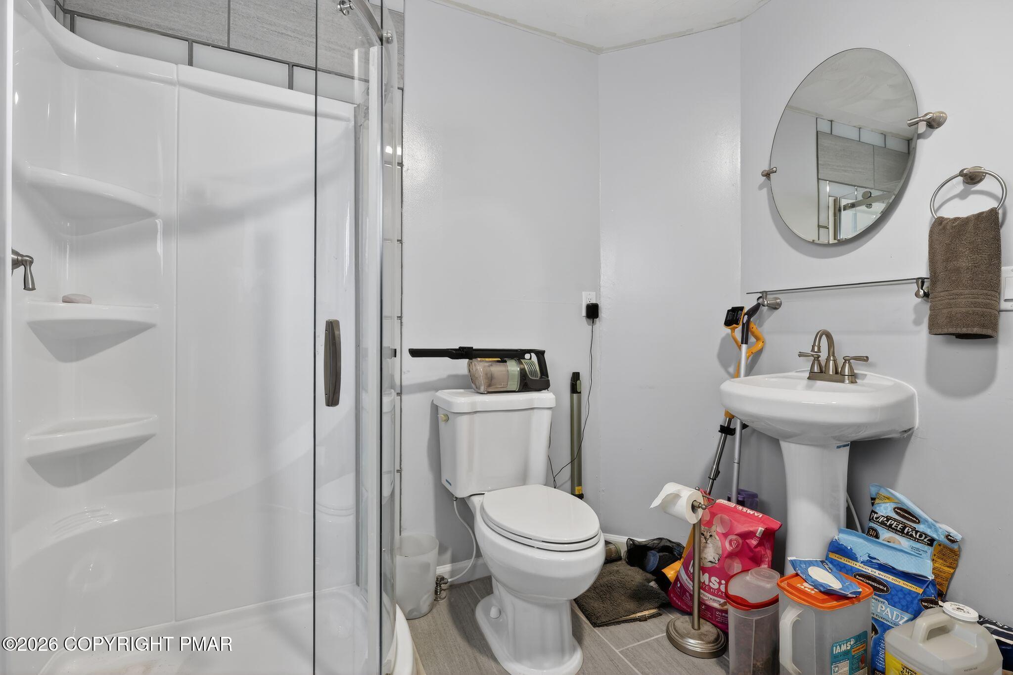 411 Moosic Road Old Forge, PA 18518 - Photo 40 of 59 a bathroom with a toilet sink and shower