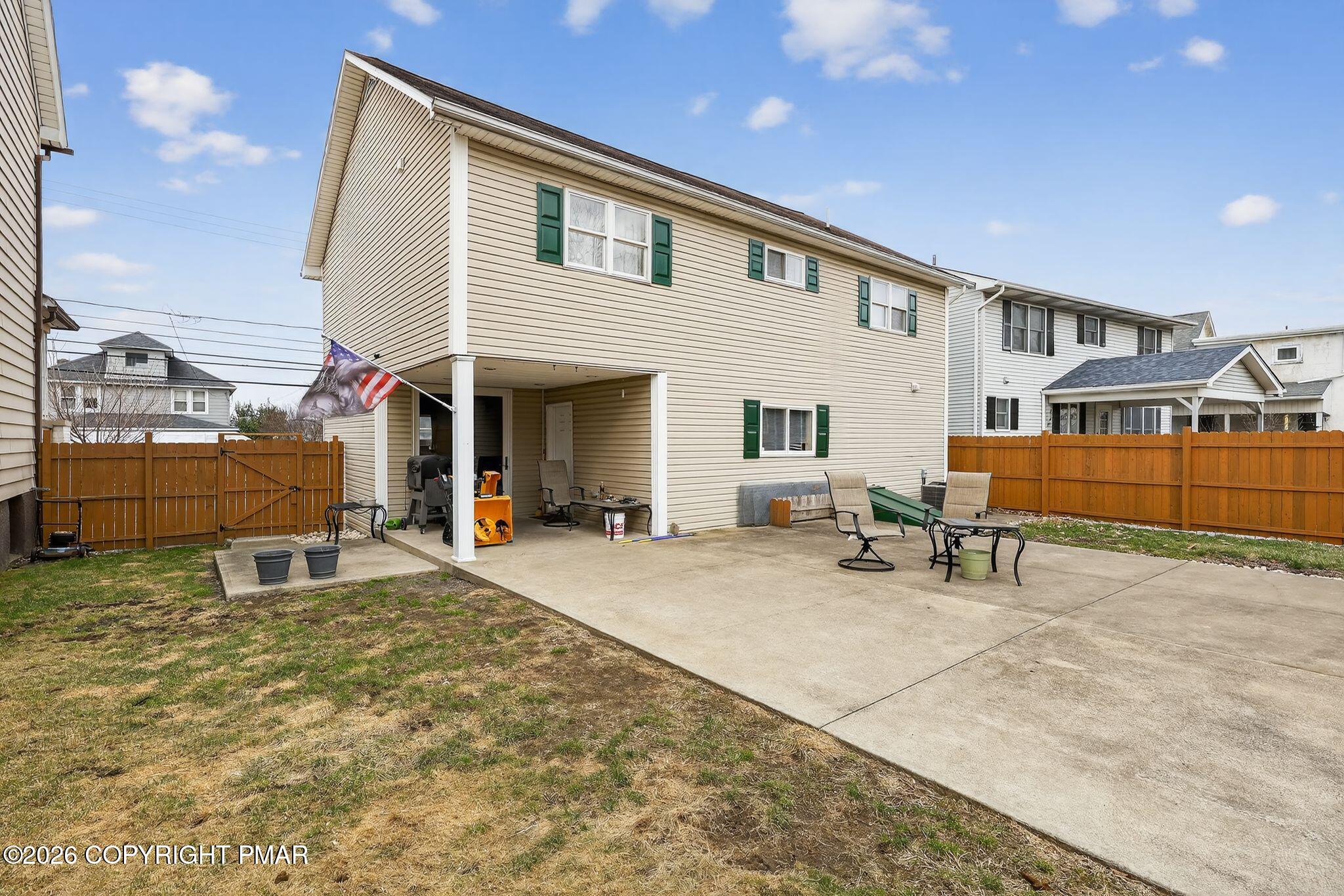 411 Moosic Road Old Forge, PA 18518 - Photo 4 of 59 a view of a house with backyard porch and sitting area