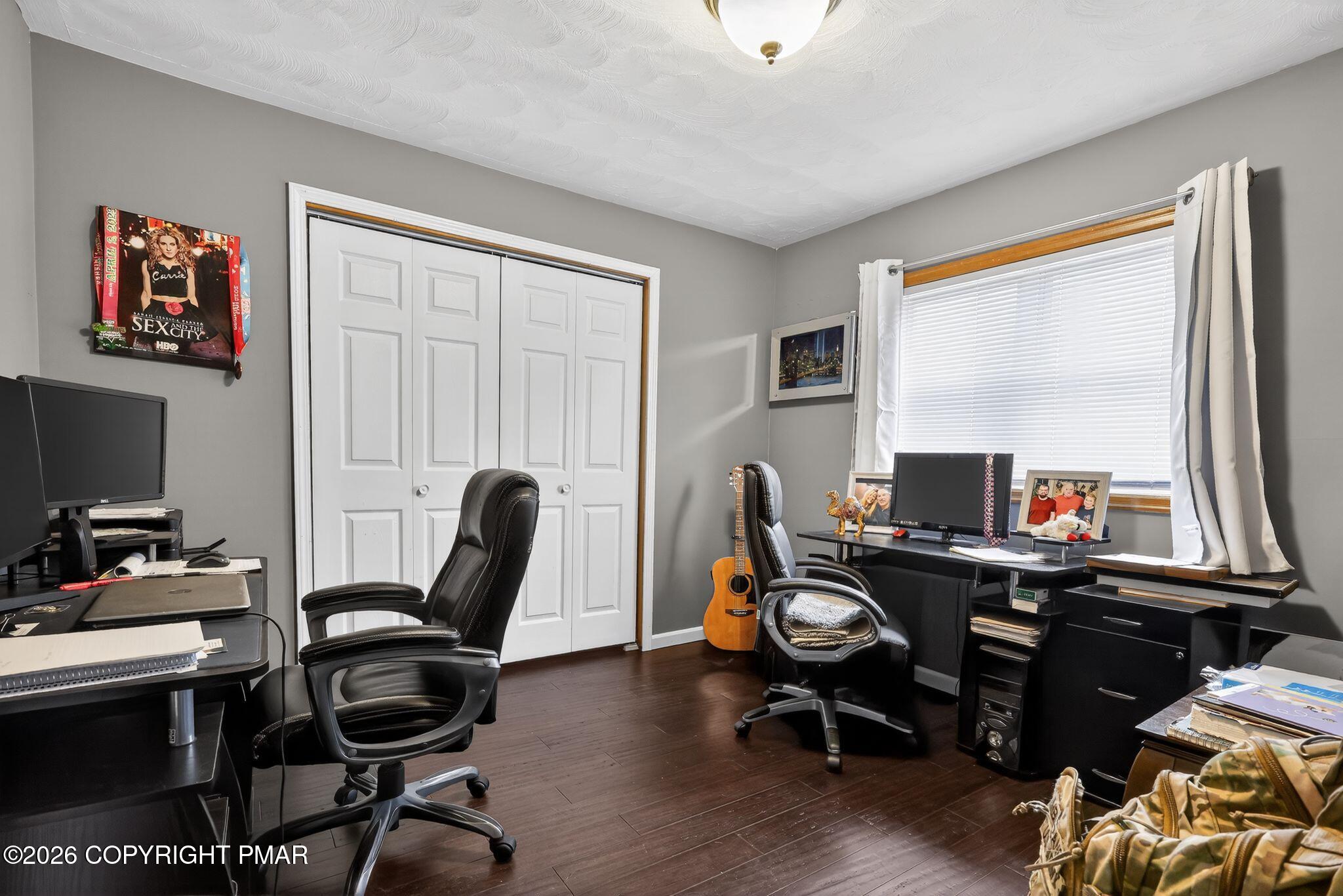 411 Moosic Road Old Forge, PA 18518 - Photo 42 of 59 a view of a workspace with furniture and a window