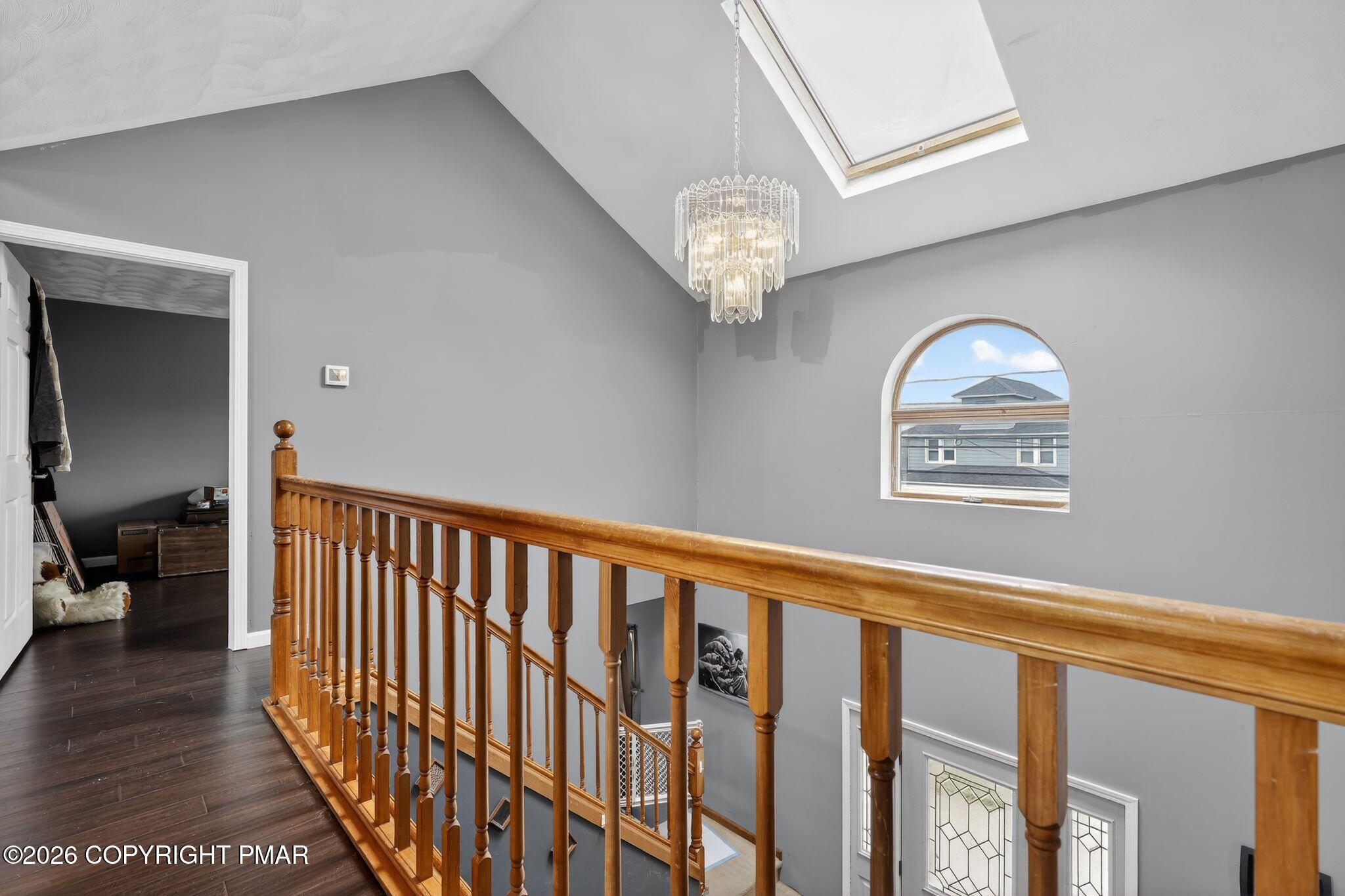 411 Moosic Road Old Forge, PA 18518 - Photo 44 of 59 a view of a hallway with entryway wooden floor and stairs