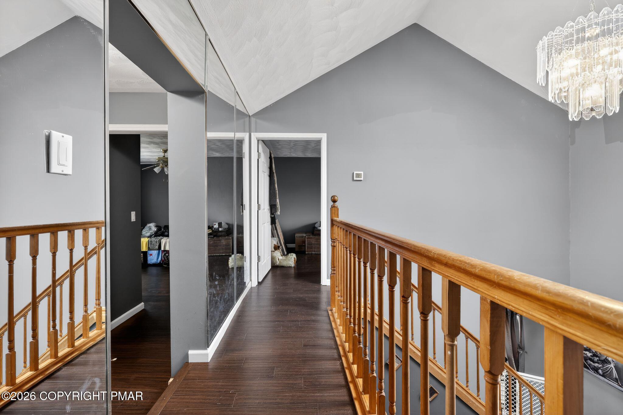 411 Moosic Road Old Forge, PA 18518 - Photo 48 of 59 a view of a hallway with wooden floor and staircase
