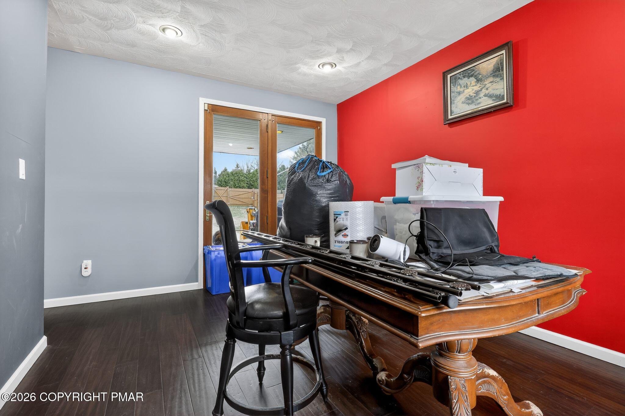 411 Moosic Road Old Forge, PA 18518 - Photo 50 of 59 a living room with furniture and a wooden floor