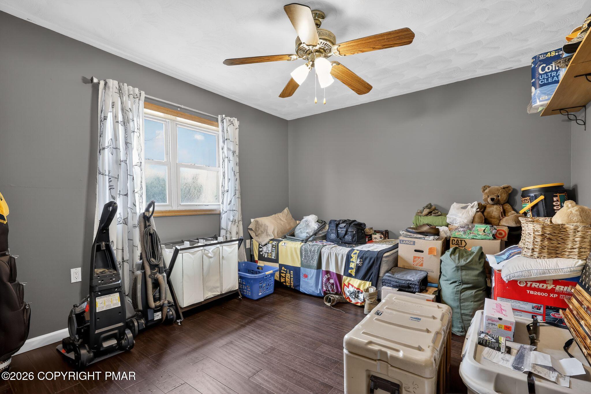 411 Moosic Road Old Forge, PA 18518 - Photo 52 of 59 a bed room with a bed and a window