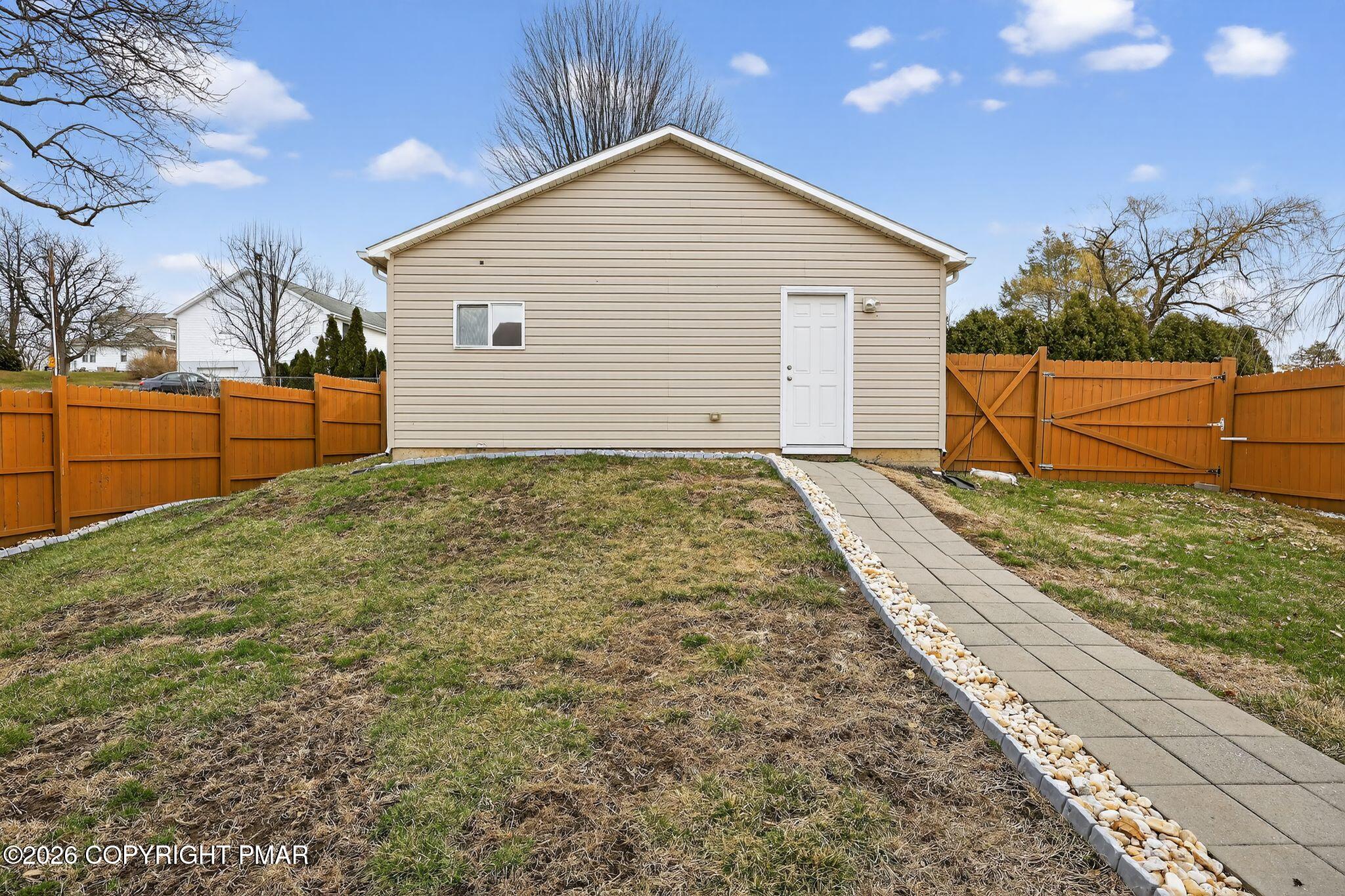 411 Moosic Road Old Forge, PA 18518 - Photo 9 of 59 a view of a backyard of the house