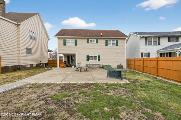 a view of a yard with an outdoor space
