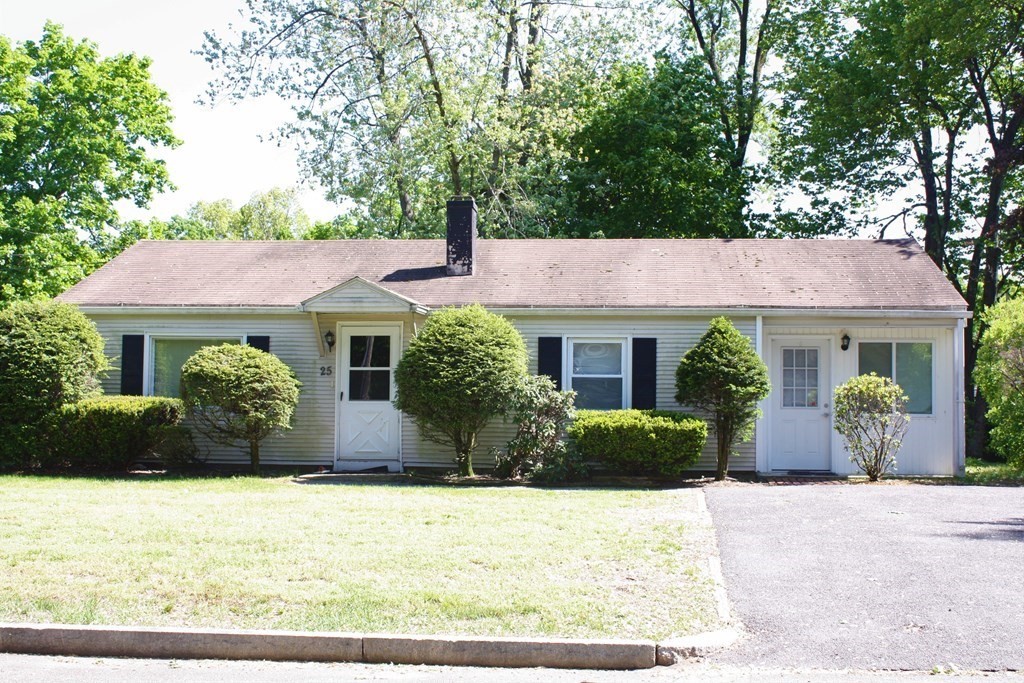 25 Kirk Drive Springfield, MA 01109 - Photo 1 of 14 front view of a house with a garden