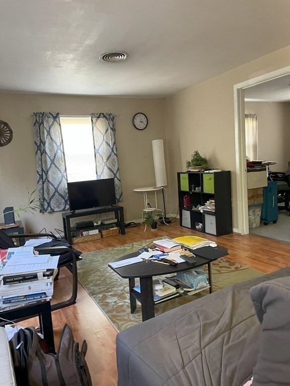 25 Kirk Drive Springfield, MA 01109 - Photo 6 of 14 a room with furniture and a flat screen tv
