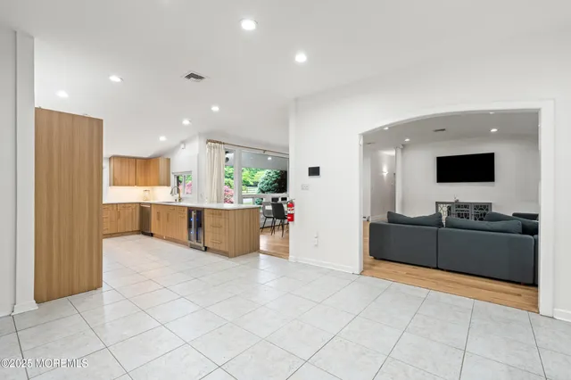 a bedroom with double bed and a window