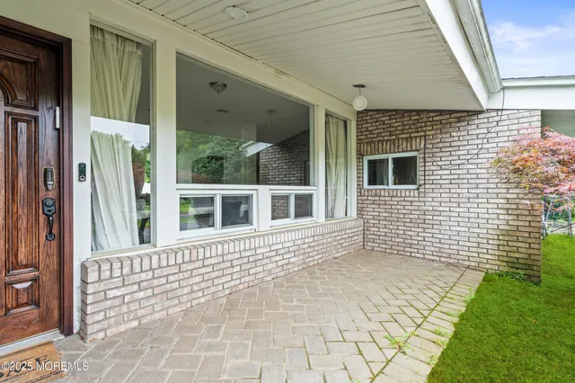 a view of a house with a porch