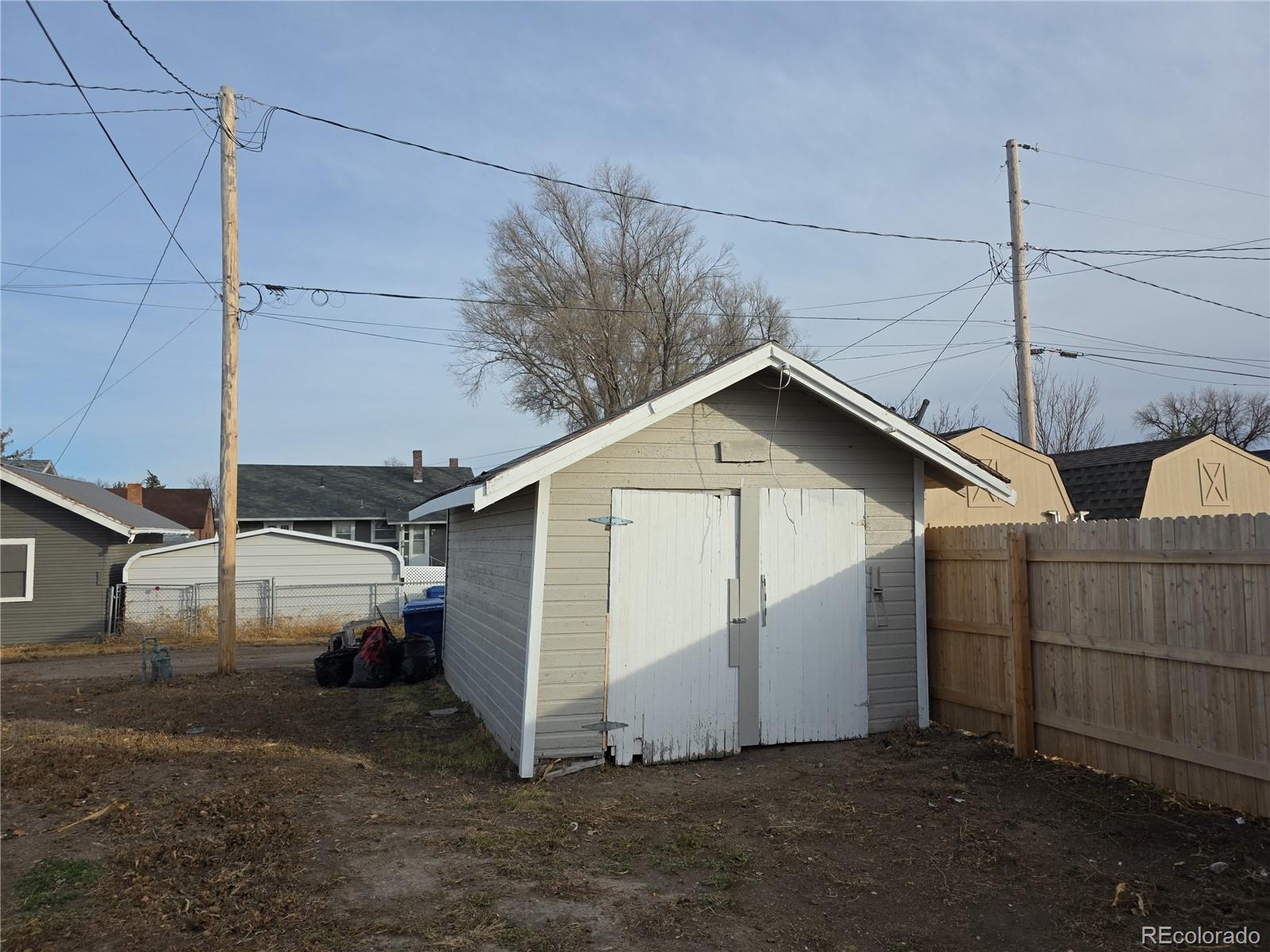 314 7th Street Ovid, CO 80744 - Photo 17 of 17 a view of a house with a garage