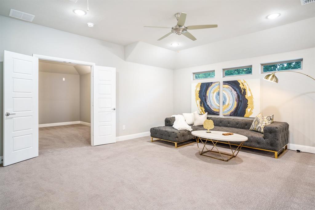 892 Panorama Drive Allen, TX 75013 - Photo 27 of 40 a living room with furniture