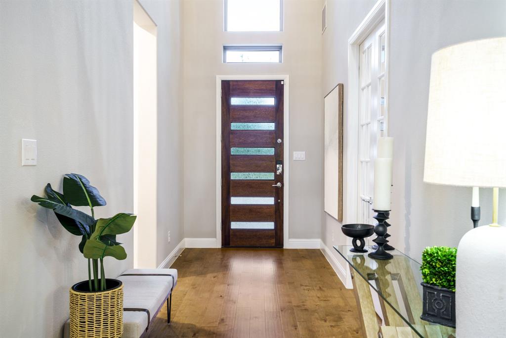 892 Panorama Drive Allen, TX 75013 - Photo 3 of 40 a living room with furniture a potted plant and a window